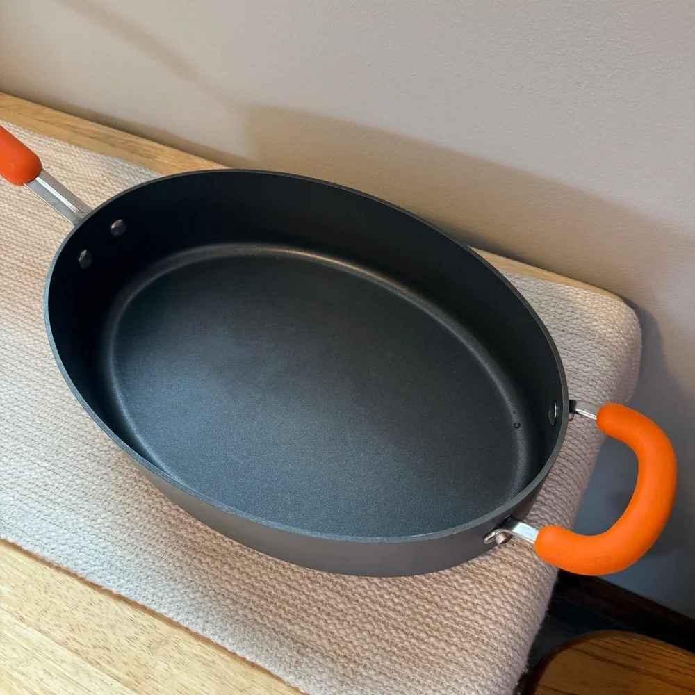 Rachael Ray Hard Anodized Nonstick Oval Saute Pan with‎ Lid Orange Handles